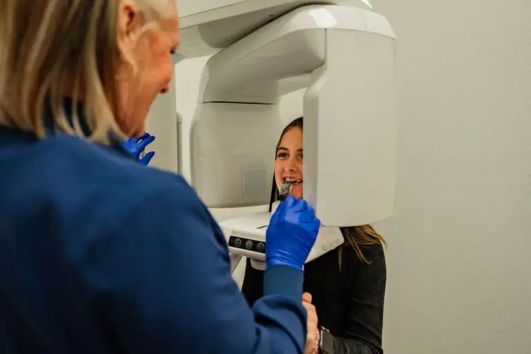 Children's orthodontics at Chauncey Orthodontics in Henderson, NV. A young patient receives a dental scan from an orthodontist.