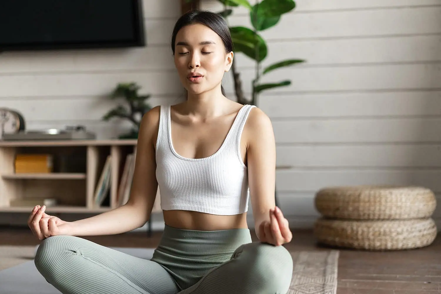 At Chauncey Orthodontics in Henderson, NV encourages embracing tranquility with meditation. Imagine sitting cross-legged on a yoga mat indoors, eyes closed, hands on knees, distancing from mouth-breathing habits amid plants and furniture.