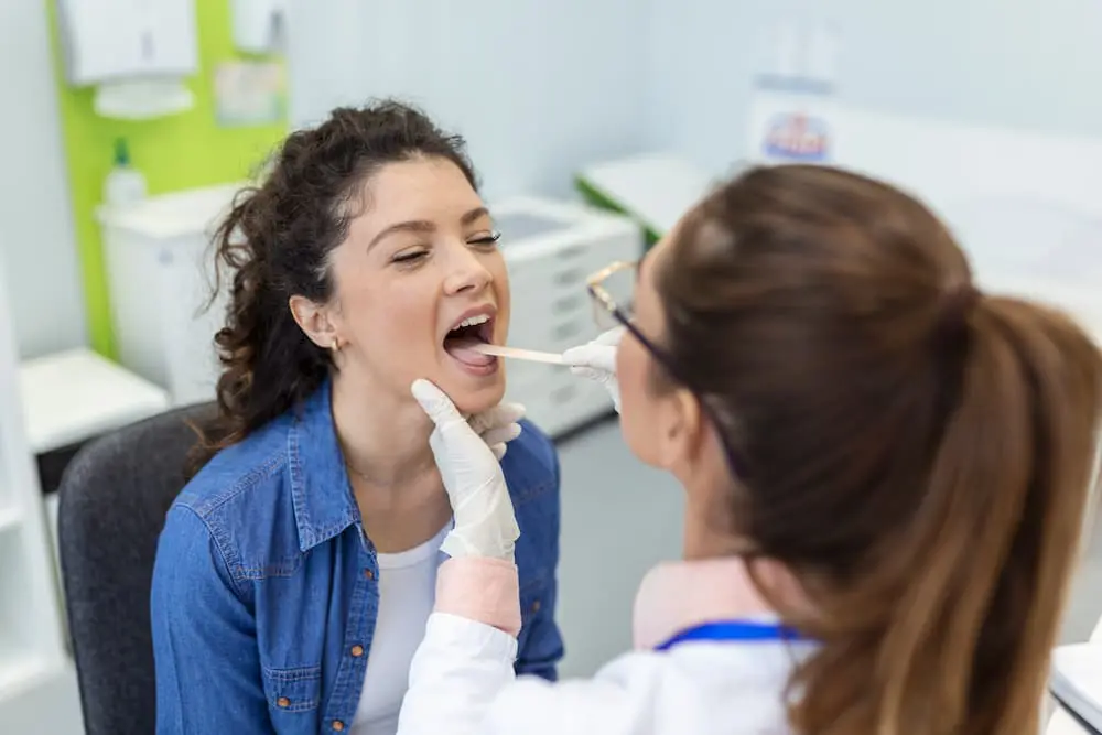 Young woman undergoing orthodontic treatment to correct tongue thrust issues at Chauncey Orthodontics operates in Henderson, NV.