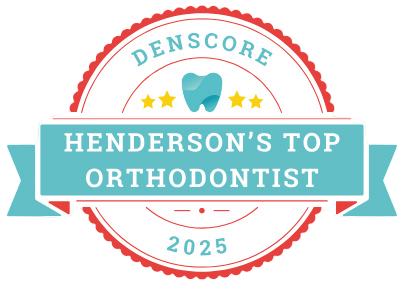 A badge reading "Denscore Henderson's Top Orthodontist 2025" with a tooth icon and four stars.